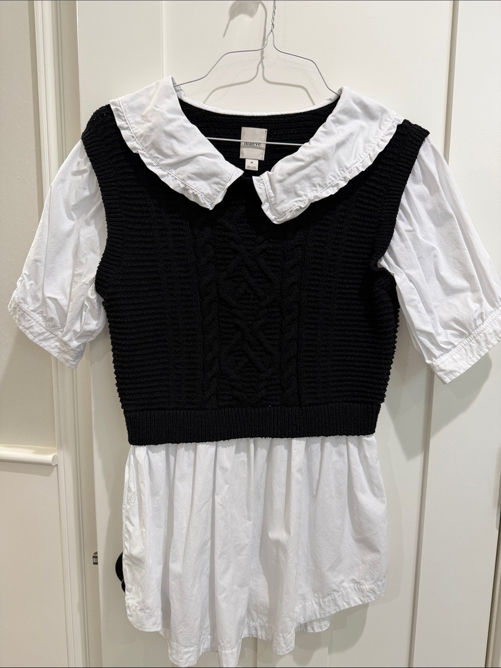 Maeve Black Knit Vest Over White Blouse with Peter Pan Collar